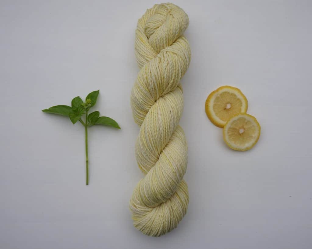 naturally dyed skein of yarn dyed with goldenrod