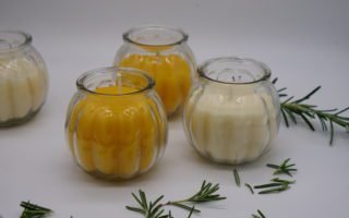 two handmade natural beeswax and two rapeseed wax candles