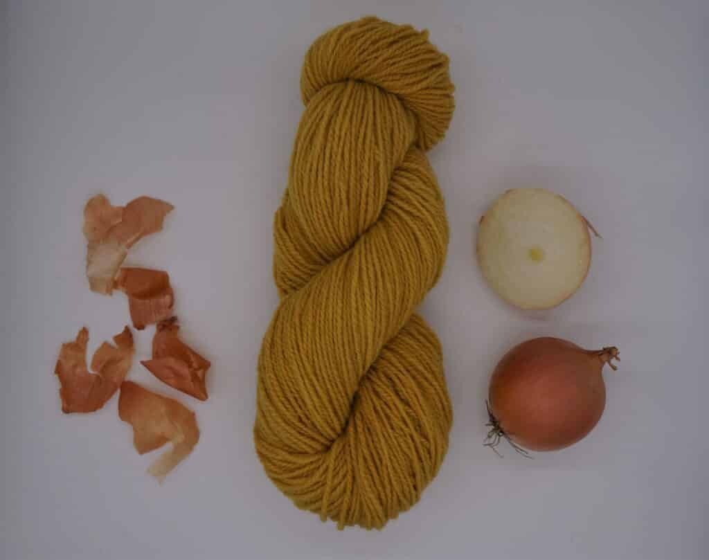 yellow skein of yarn, some onions and skins