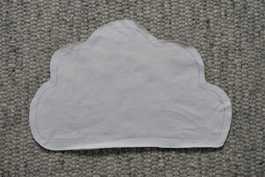 cloud shape cut out of a white fabric