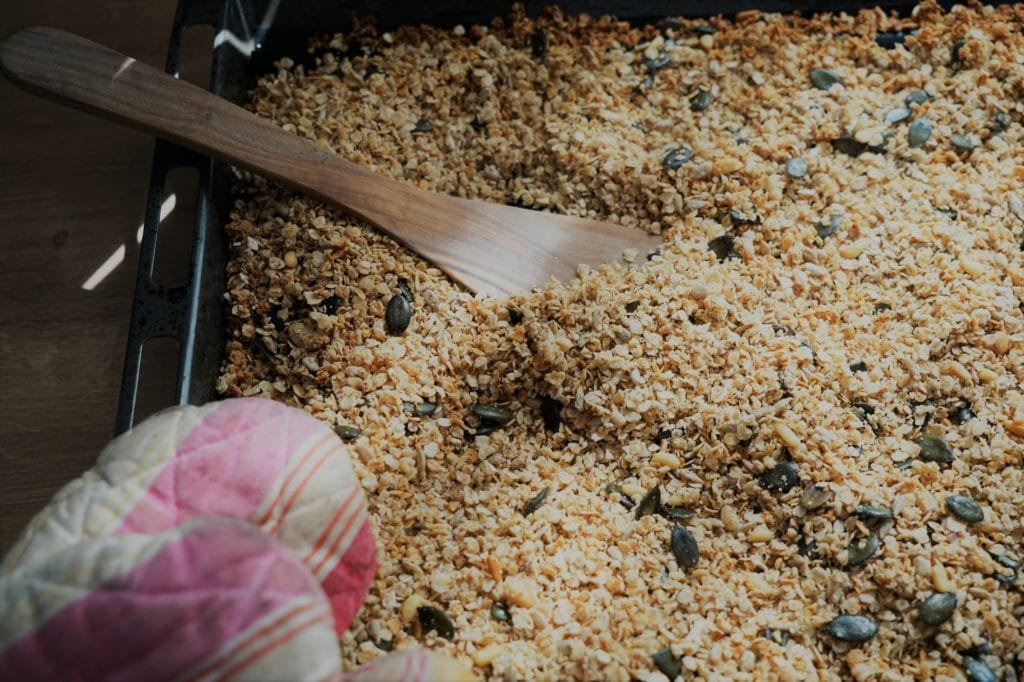 homemade granola on a baking tray