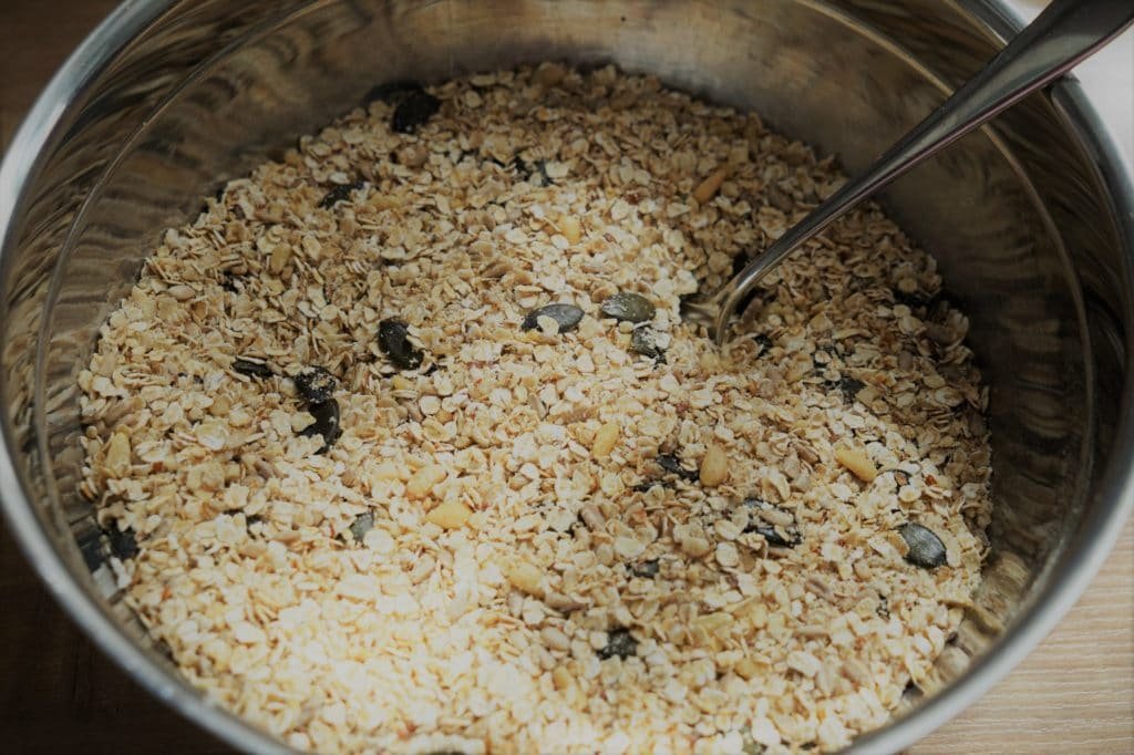 granola in a mixing bowl