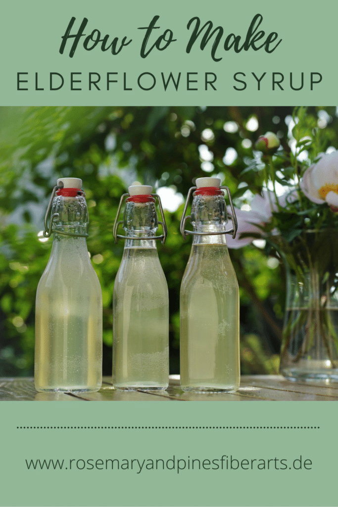 three glass bottles of homemade elderflower cordial