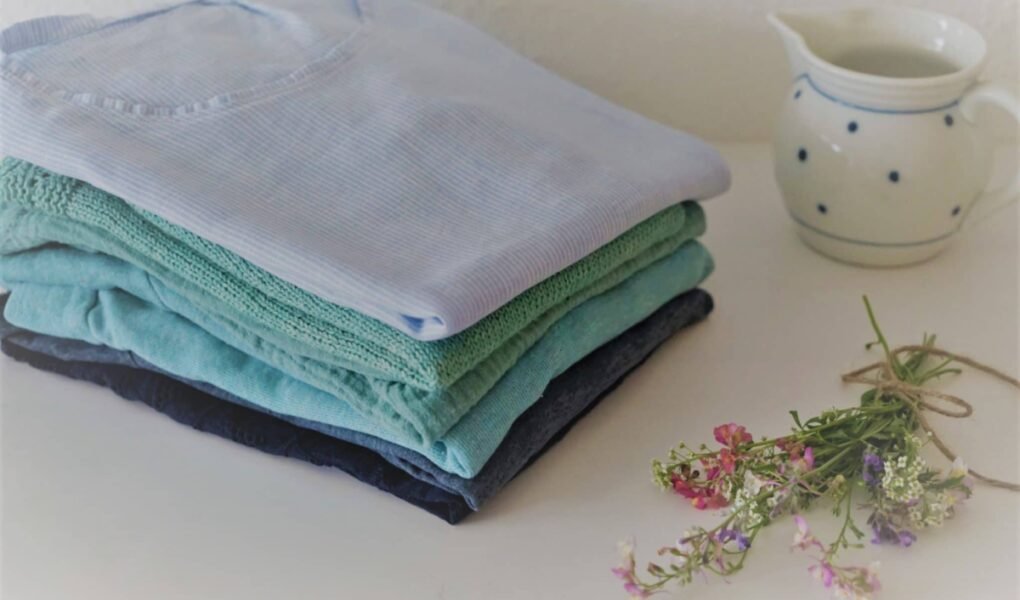 stack of handmade clothing