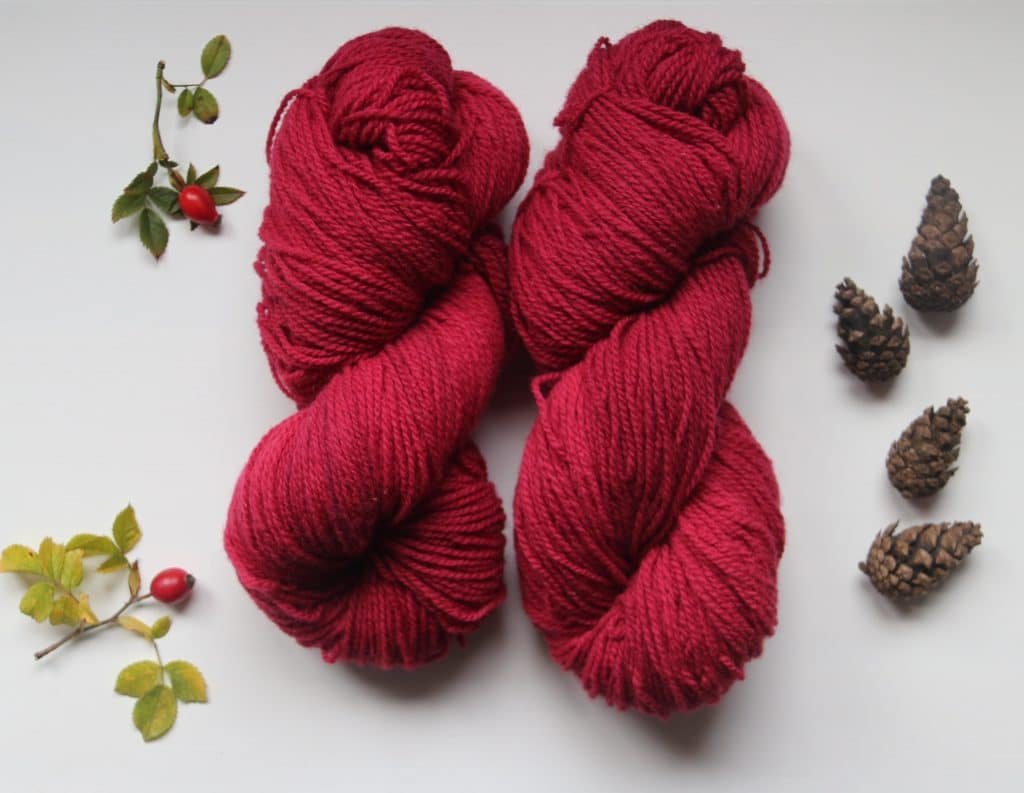 two skeins of red yarn