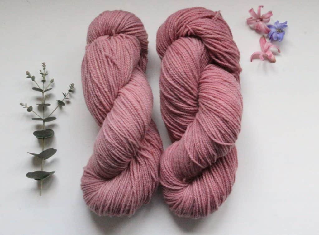 two naturally dyed pink skeins of yarn