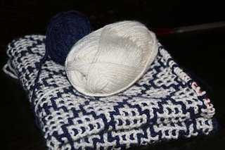 blue and white mosaic blanket as a gift for a newborn baby