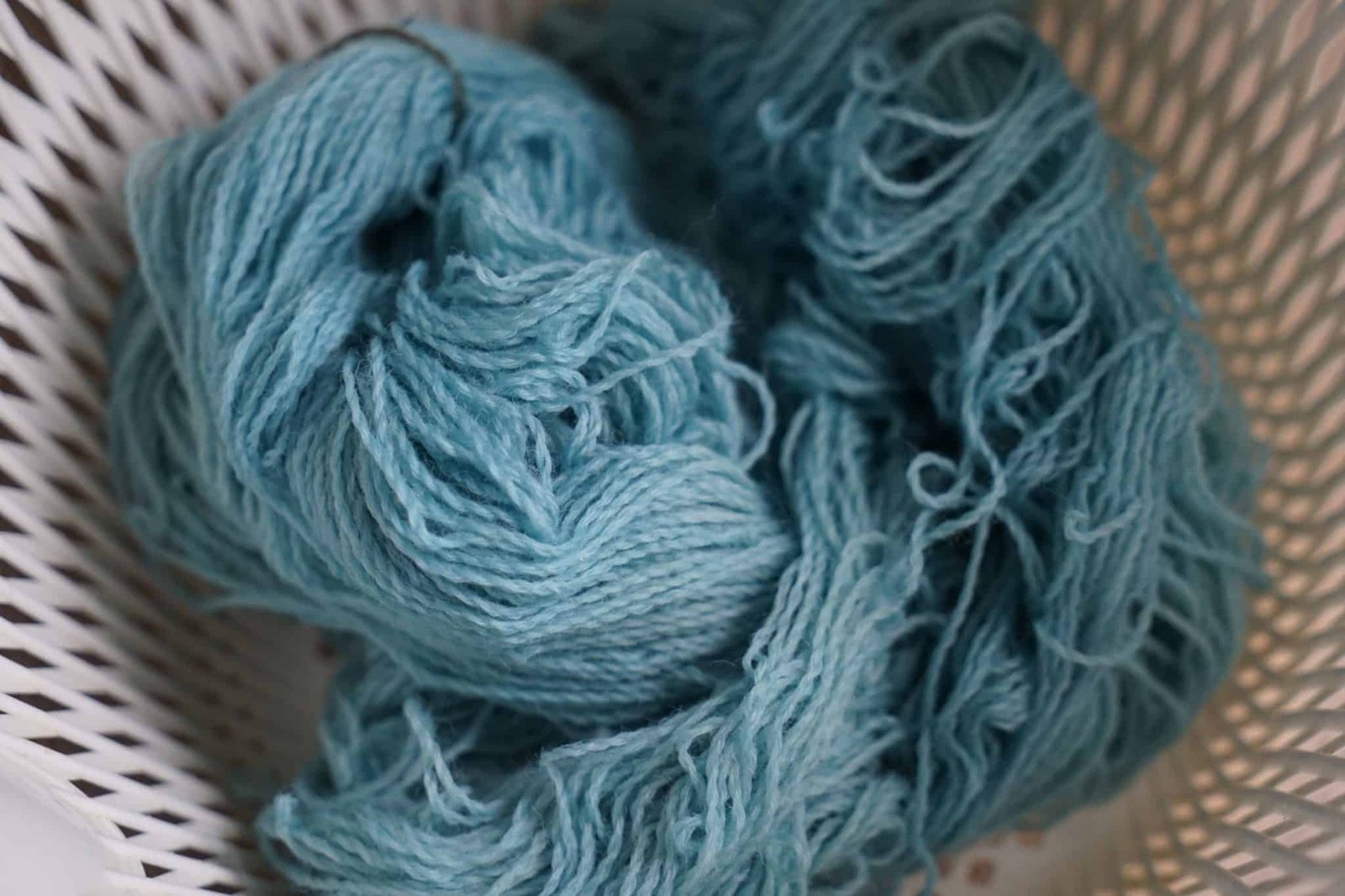 indigo dyed skein of yarn in mid tone blue