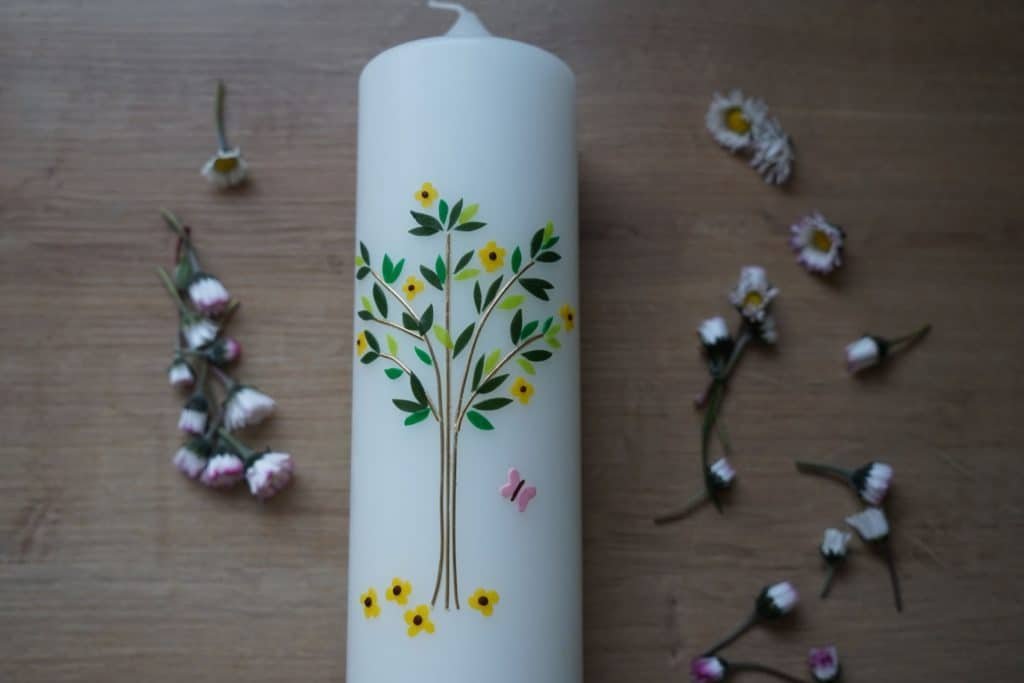 pillar candle embellished with the tree of life