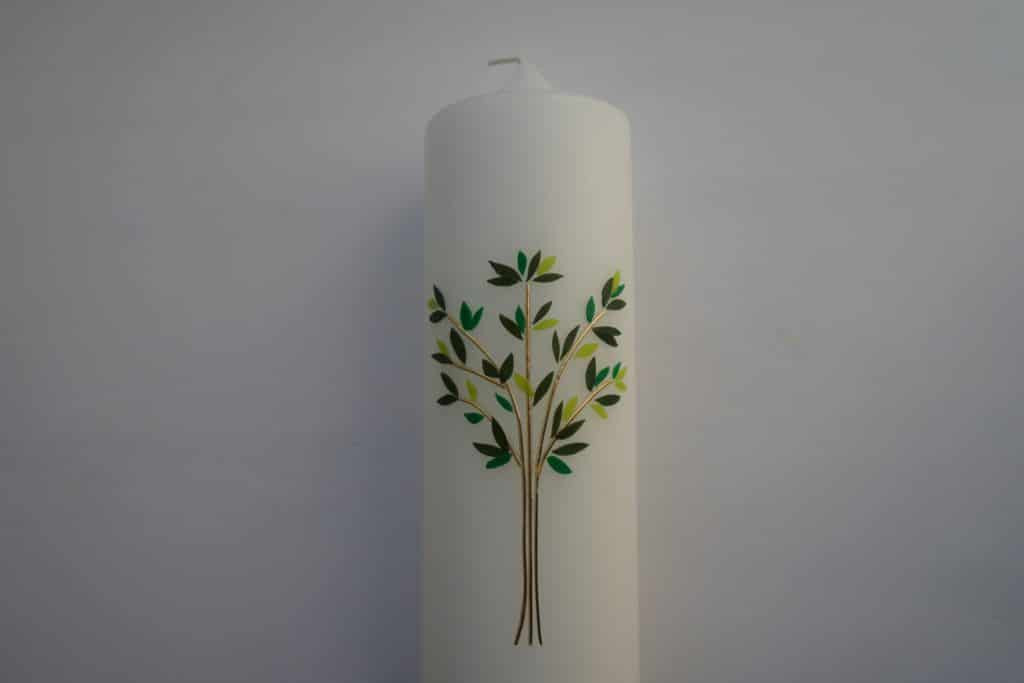 pillar candle embellished with the tree of life