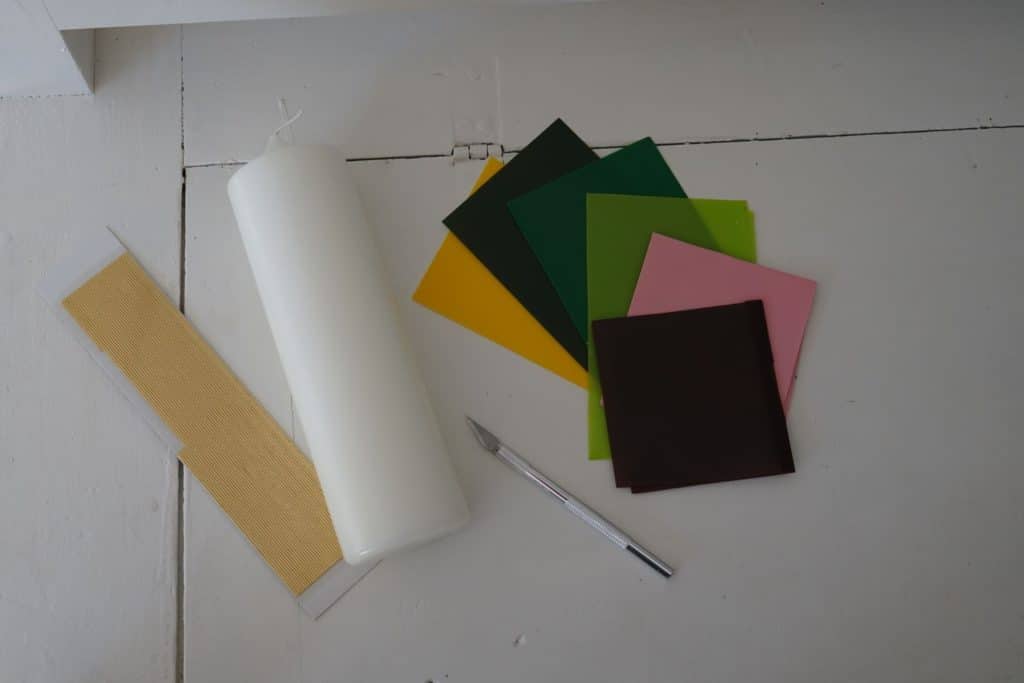 materials for candle embellishment: wax sheets, wax strips, pillar candle and precision cutting blade