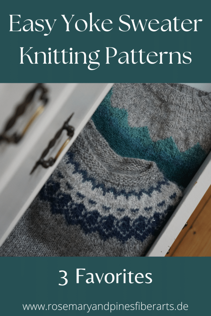two circular yoke sweater peeking out of a white dresser