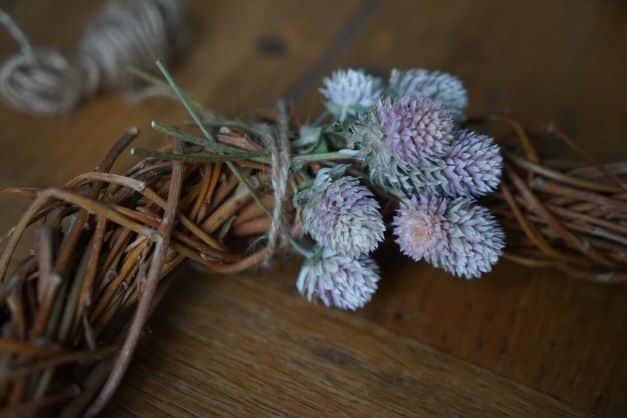 first step of making a dried flower wreath