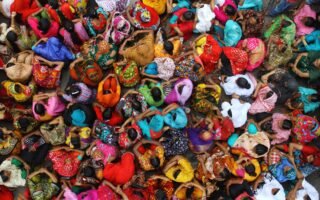 overhead shot of female garment workers in Bangladesh in colorful clothing