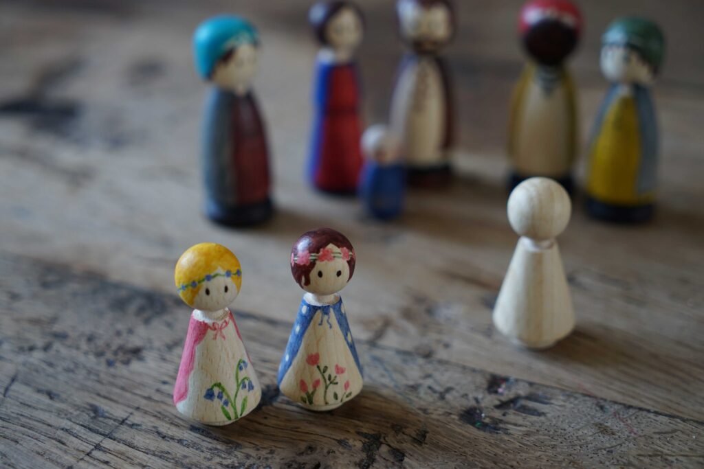 painting wooden peg dolls making process
