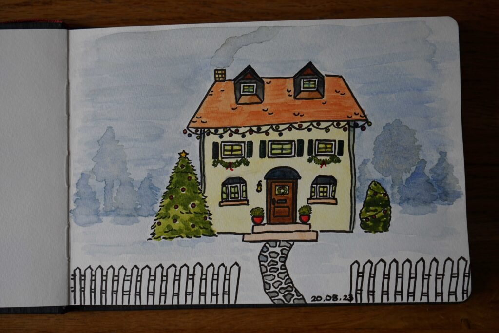 small cottage in the woods with a white picket fence in front decorated for the holidays