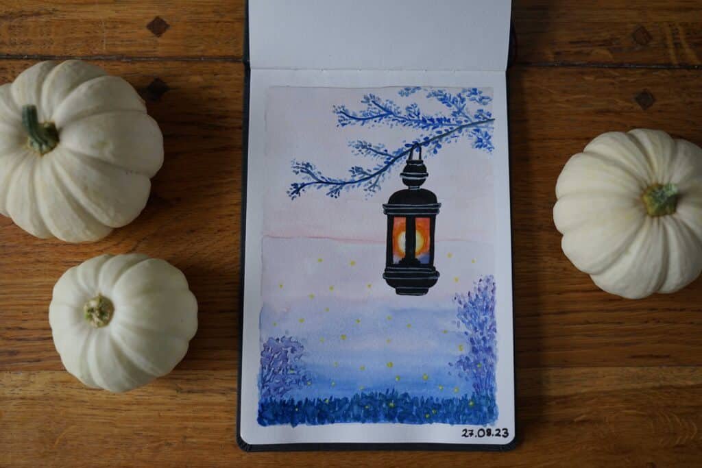 watercolor and ink painting of a lantern with fireflies during sunset on a wooden surface, some white pumpkins are sitting next to the open sketchbook